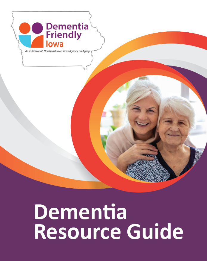A dementia resource guide with two women smiling.